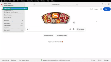 Safari open on Mac with Safari menu open and Settings highlighted
